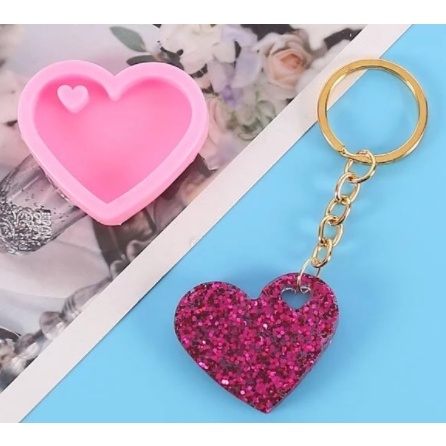 Coração de resina com glitter rosa intenso